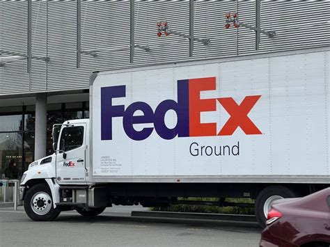 Download Fedex Tracking Delivery Truck Parked Wallpaper Wallpapers Com Download Fedex Tracking Delivery Truck Parked Wallpaper Wallpapers Com